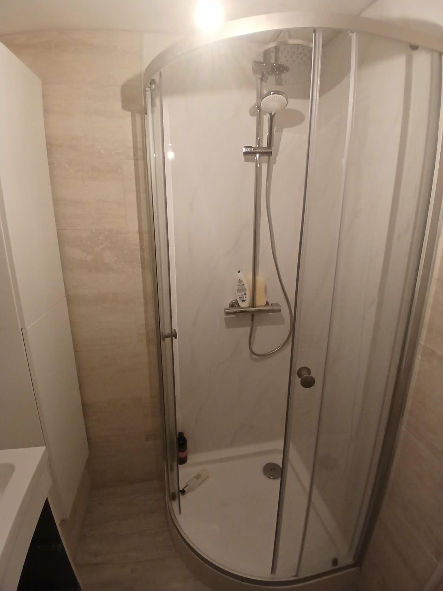 Marble effect shower with quadrant enclosure